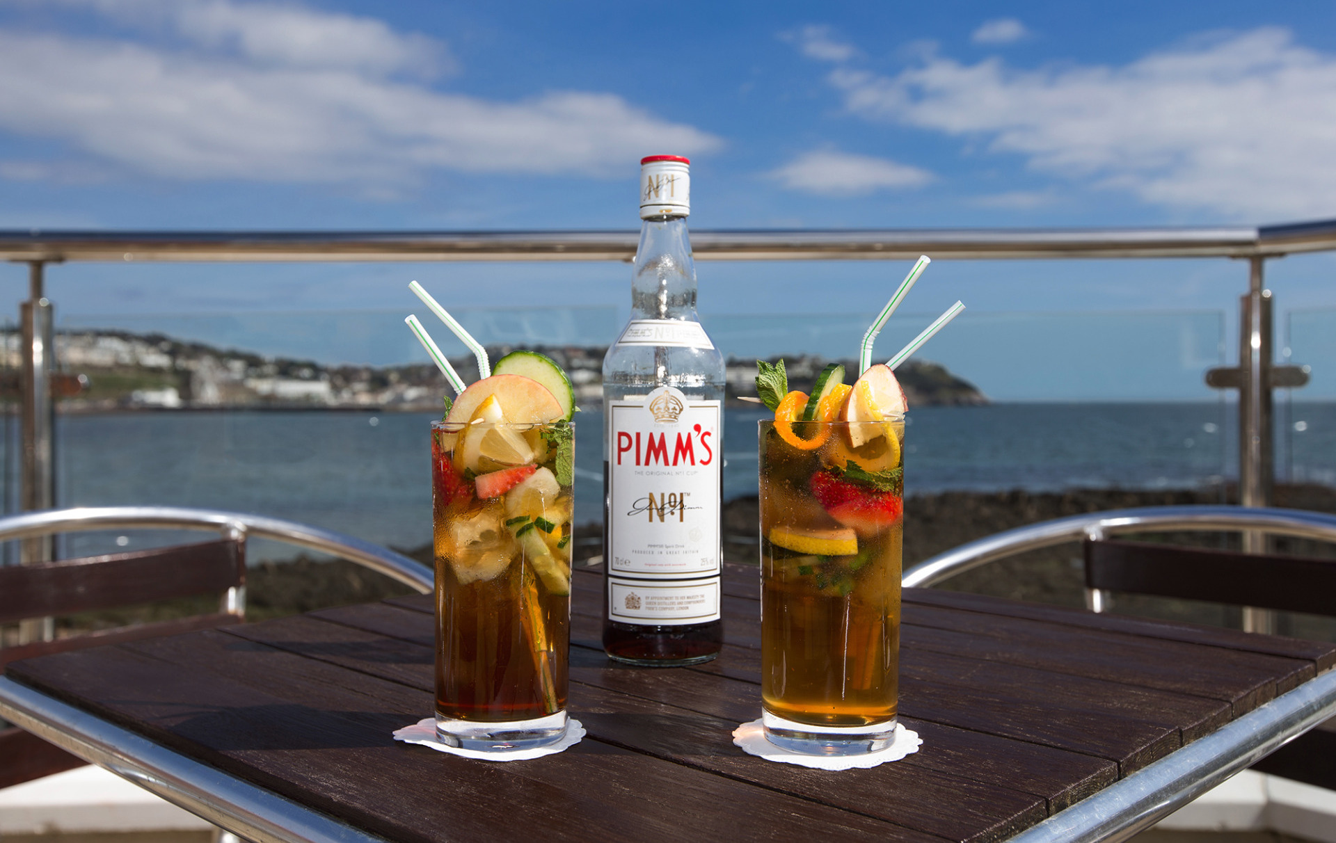 Pimm's for two on the sun terrace overlooking Torquay Bay