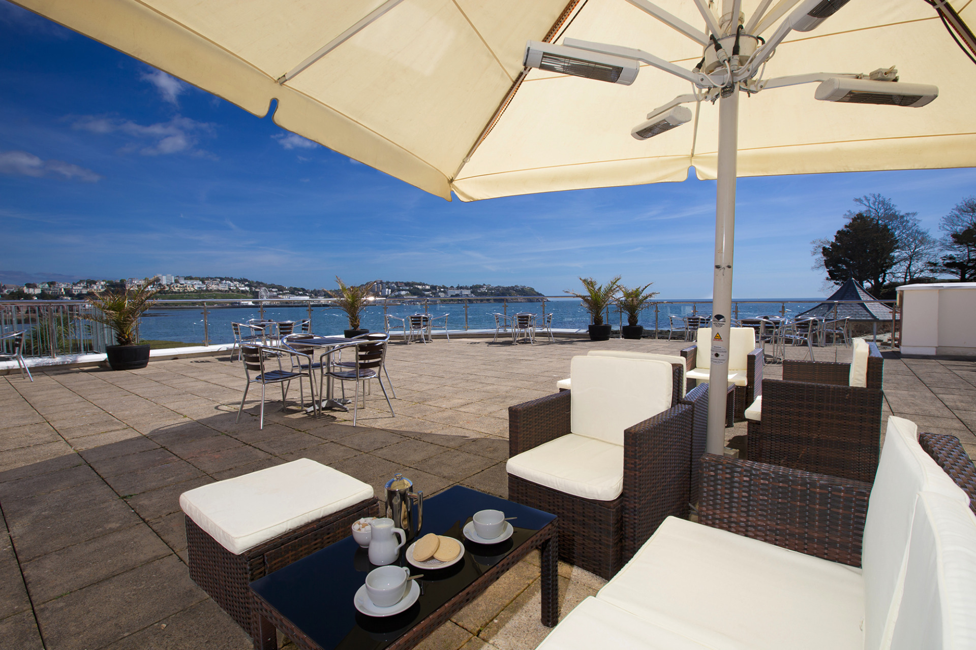 Sun terrace overlooking the sea at Livermead Cliff Hotel
