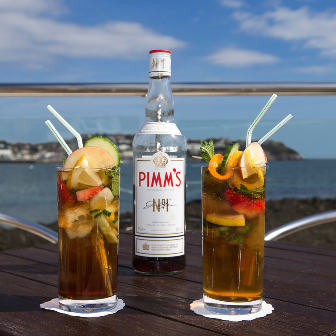 Pimm's for two on the terrace overlooking the sea